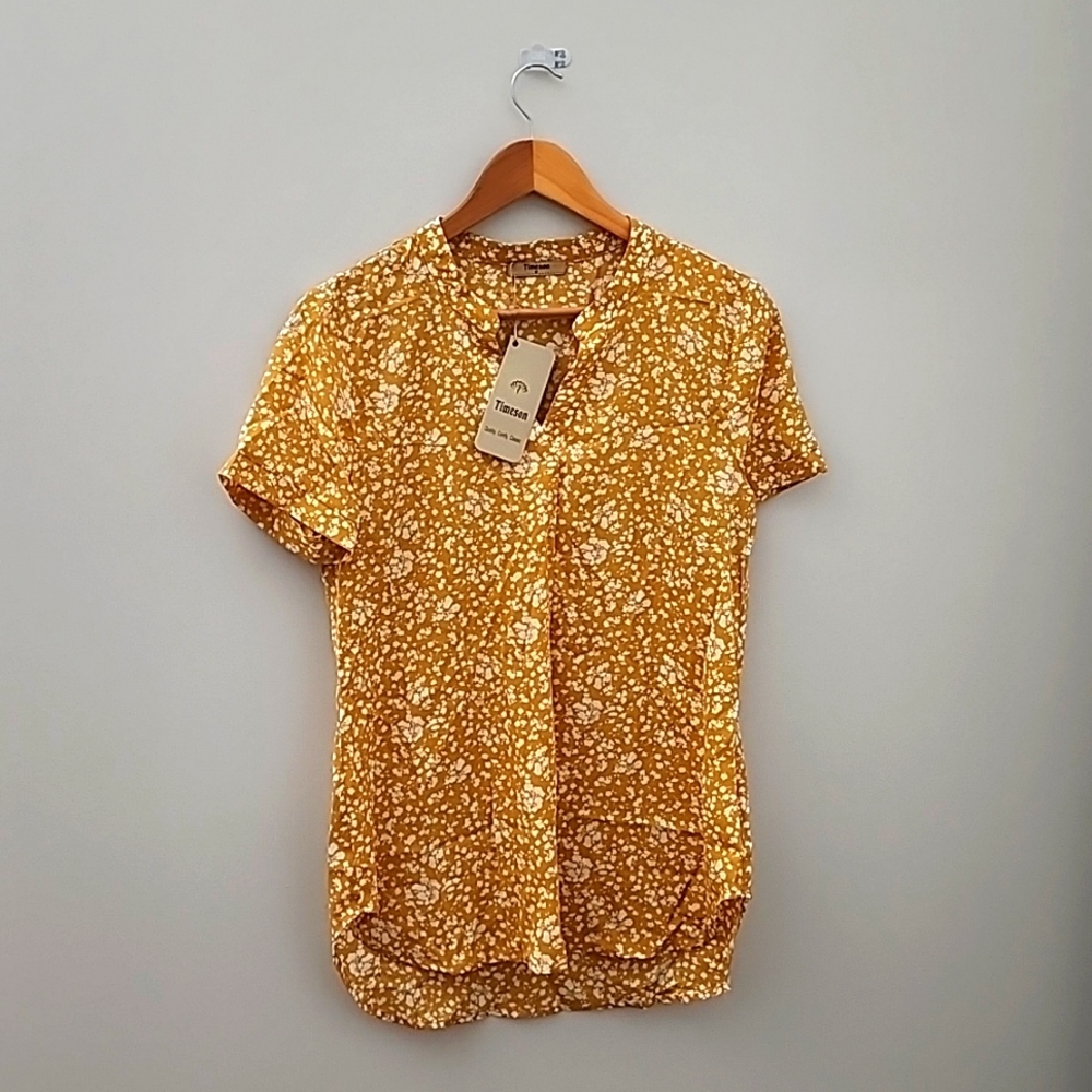 Yellow floral short sleeve blouse.
